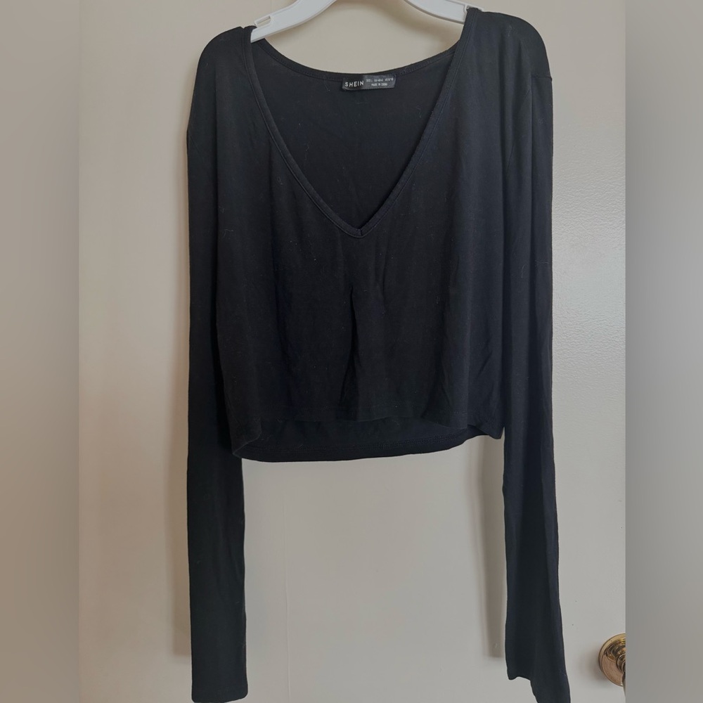 Black long sleeve top with V-neck